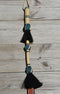 Close Up View Beautiful Jose Ortiz  Braided Rawhide Quirt Whip with Hitched Horsehair Knots and Hand Tooled Leather Popper.   Natural colored rawhide with turquoise blue and black details. 