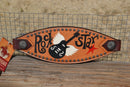 Close Up View Bar H Equine Bronc Noseband with Painted "Rock Star" guitar motif and Sunspot Studs on the border.