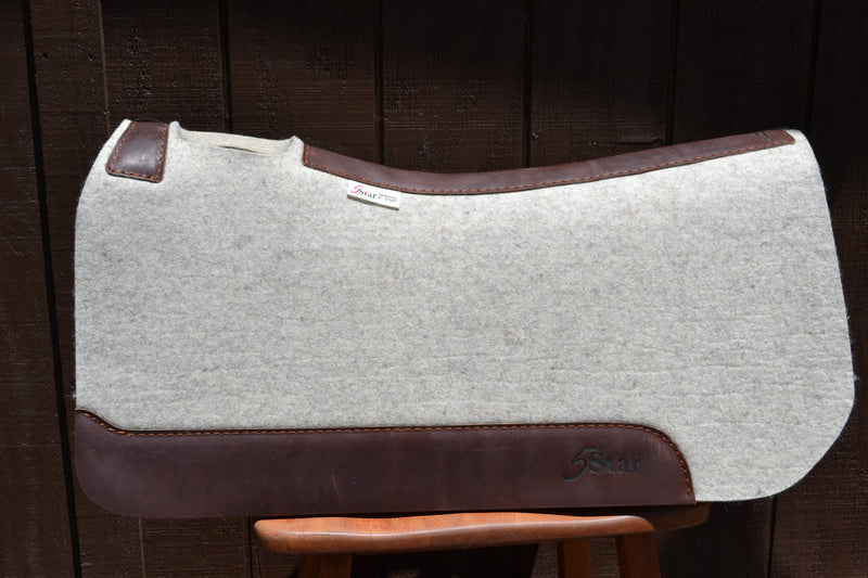 5 Star Equine Products performer saddle pad in natural felt and one inch thick.