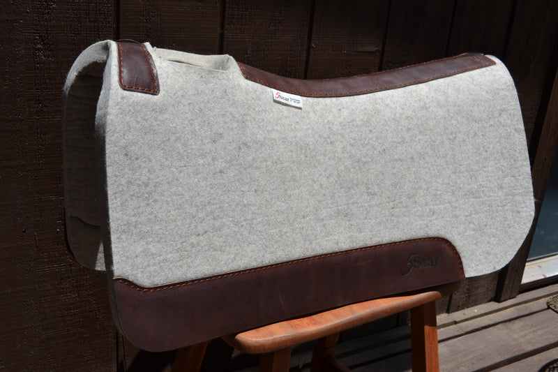 5 Star Equine Products performer saddle pad in natural felt and one inch thick.