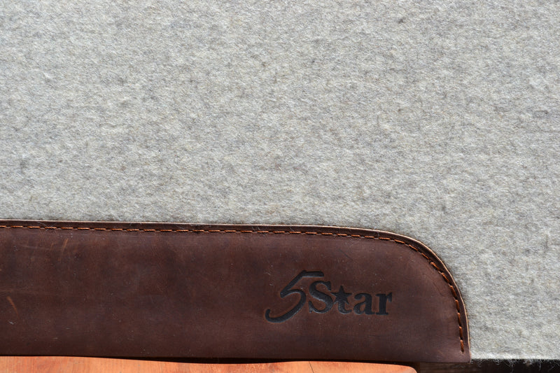 Close up of 5 Star Logo stamped into the brown wear leather.