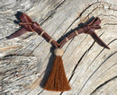 Jose Ortiz handmade 1/2" latigo leather curb strap with tightly braided natural rawhide knot and chestnut mane horsehair tassel.  9" in length and attaches with self-tie bit attachments and no metal hardware. 