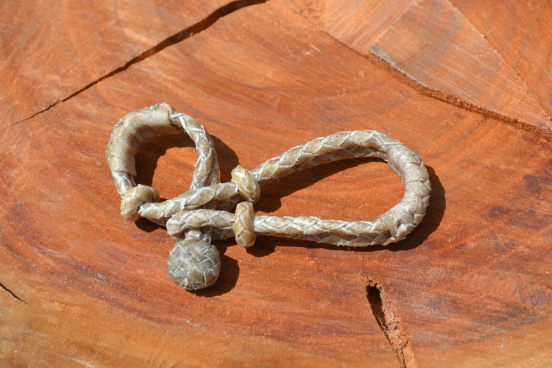 Hand Braided Natural Rawhide Bit / Rein Connector.  Made from 4 plait natural rawhide with sliding knot and loop attachments. 