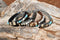 Close Up View Various Colors Awesome 3/8" wide, 3 Strand Braided Horsehair Bracelet with a lobster claw clasp and various colored and patterned bone beads. Various colors