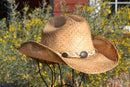 Close Up Alamo Hat Company - South Texas Rustic Raffia Festival Cowboy Hat with shapeable brim.    The hat is soft and the brim has a wire border that holds just about any shape you like.  Great for trail riding, days at the beach, or for those long days at the river or music festival.  Comes with concho hatband and adjustable leather stampede string.  A best buy in straw hats.  Sized Small - X-Large.  