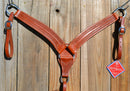 Reinsman Heavy Duty 2" Double Ply Leather Breast Collar with Hand Carved with Snake border tooling.  Warm mahogany color leather.  Stainless steel hardware and tugs and cinch drop.   1" x 12" adjustable tugs. 