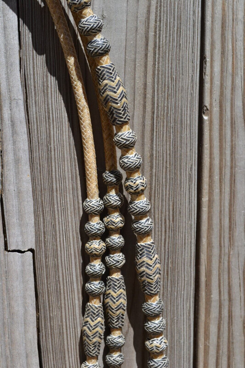 Jose Ortiz 12 plait Braided Natural Rawhide Romel Reins w/Black - Oklahoma - 52"