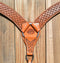 Close Up View Reinsman Heavy Duty 2" Double Ply Contoured Breast Collar with Hand Carved with Waffle Box Tooling.    Stainless steel hardware and tugs.   1" x 12" adjustable elastic tugs.   Old West antiqued wash color.