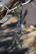 Close Up View Handmade natural horsehair braided key chain with silver tone faux buckle and snap. This key chain is about 6" long including the 1" key ring loop to connect the keys.     Black/Purple/Turquoise
