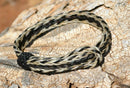 Awesome 1/2" wide, 3 Strand Braided Horsehair Bracelet with sliding knot.  The unique sliding knot XL design expands up to 10".  Unisex.  Very durable and makes a great gift for any horse lover. White/Black/Black