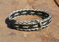 Awesome 5/8" wide, 5 Strand Braided Horsehair Bracelet with sliding knot.  The unique sliding knot design can expand up to 10".  Unisex.  Very durable and makes a great gift for any horse lover. White/Black/White