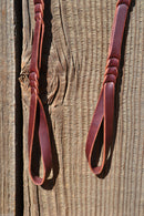 Close Up View Beautiful single-ply 3/8" latigo self-tie bosal hanger. Works great as a noseband hanger too. Traditional style - self-tie with no bulky metal hardware. Latigo color may vary from light to dark burgundy. 