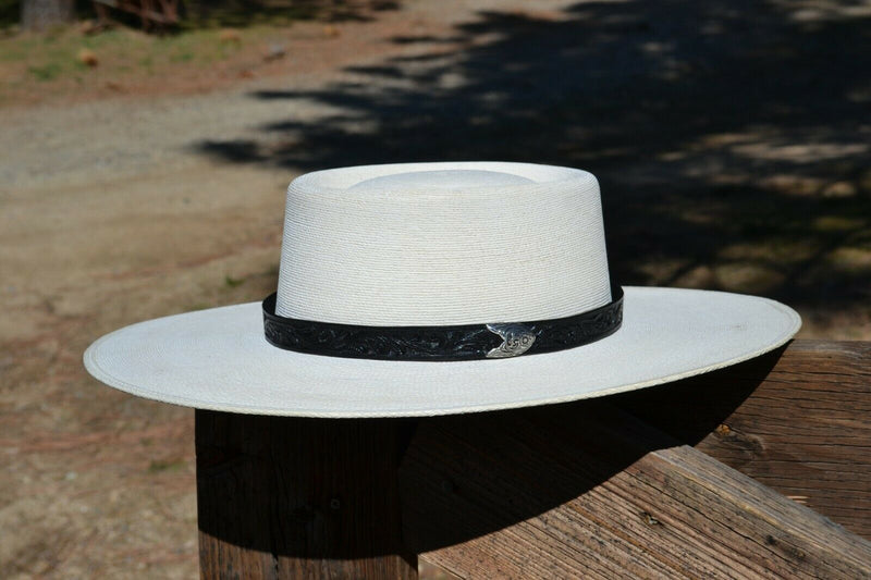 Side View Beautiful 3/4" Carved Leather Hatband in black.  Made from 3/4" wide leather with engraved silver tip prong buckle. 