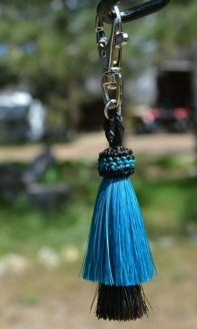 Close Up View 4.25" total length natural horsehair zipper pull with Larger Clasp. Handmade horsehair in the two bell mule tail style.             Turquoise/Black