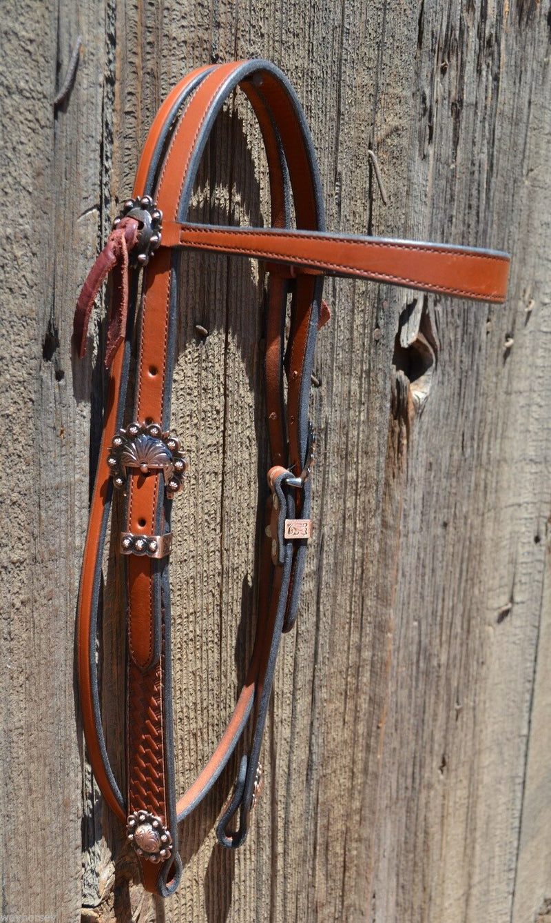 Right Side View Classic Straight Flared Browband Headstall. Constructed of warm two-ply and stitched medium russet oil bridle leather with basket weave tooling on the flared cowboy cheek pieces. 