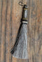 Close Up View 4 1/2" total length horsehair zipper pull with spring clip. Handmade horsehair various colors and beading pattern. Grey-Gold/Silver/Gold