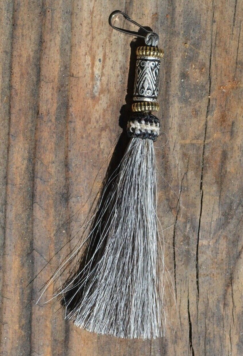 Close Up View 4 1/2" total length horsehair zipper pull with spring clip. Handmade horsehair various colors and beading pattern. Grey-Gold/Silver/Gold