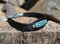 Close Up View  Awesome 3/8" wide, 3 Strand Braided Horsehair Bracelet with a lobster claw clasp and various colored beads. Black/Turquoise