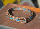 Awesome 1/2" wide, 3 Strand Braided Horsehair Bracelet with sliding knot.  The unique sliding knot XL design expands up to 10".  Unisex.  Very durable and makes a great gift for any horse lover. Sorrel/Turquoise/Sorrel