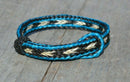 Awesome 1/2" wide, 3 Strand Braided Horsehair Bracelet with sliding knot.  The unique sliding knot XL design expands up to 10".  Unisex.  Very durable and makes a great gift for any horse lover. Turquoise/Black/White