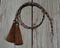 Close Up View natural horse hair stampede string with cotter pin attachments. Sorrel/Black/White/Sorrel