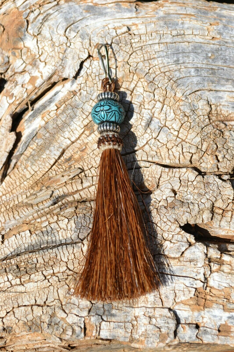 Close Up View 4 1/2" total length horsehair zipper pull with spring clip. Handmade horsehair various colors and beading pattern. Sorrel-Silver/RTQ/Silver