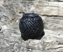 5/8" Hand Braided Natural Rawhide Wild Rag / Cowboy Scarf Slide.  Natural rawhide dyed black.  Smooth leather interior with 5/8" center hole, 1 1/4" in diameter and 1 1/4" high.
