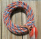 Special Patriot Edition - Hand made by Jose Ortiz, 5/8" x 22' mecate made from 6 tightly hand twisted (not machine twisted) strands of red, white and blue color mane hair with a soft leather popper at one end turks head knot on the other.
