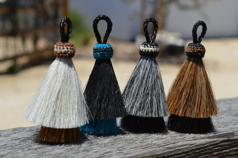 Close Up View Various Colors 3" two Bell mule tail cut natural and brightly colored tassels. Handmade from horsehair dyed in bright colors as well as natural.