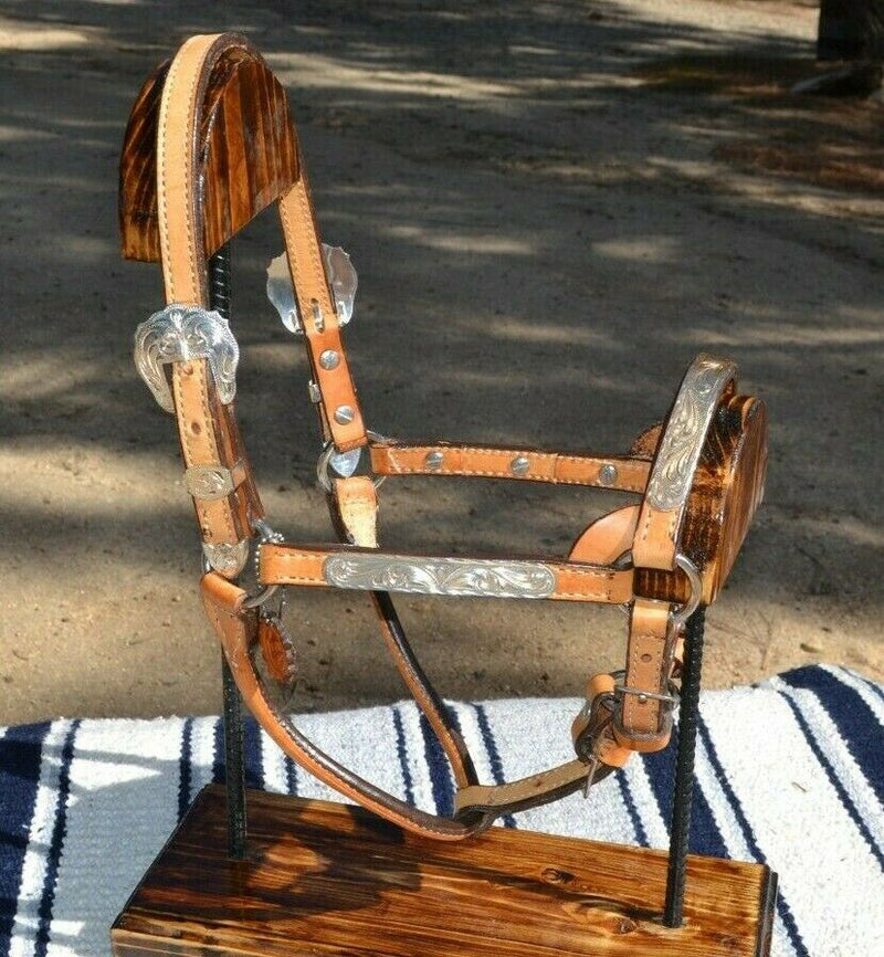 Beautiful Alamo Saddlery Weanling Show Halter.  Light oil leather with engraved German silver overlay.   Adjustable crown, nose and connector piece.  Weanling size. 