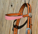 Close Up View Custom hardware. Alamo Saddlery - Browband Headstall and Breast Collar Set.  Light Oil leather with pink gator overlay.  Stainless steel Horseshoe Brand buckles and conchos on headstall.