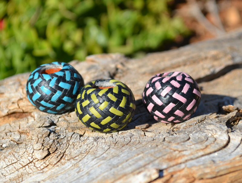 Shown: Various Colors Hand braided rawhide scarf slide.  Custom made in two-tone combinations of black and bright colored leather braided in a custom "checkerboard" pattern.