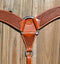 Close Up View Reinsman Heavy Duty 2 3/4" Double Ply Leather Breast Collar with Hand Carved with mini basket weave tooling.  Reinsman's "Old West"  color leather.  Stainless steel hardware and tugs and cinch drop.   1" x 12" adjustable tugs. 