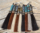 Close Up View Various Colors 4 1/2" total length natural horsehair zipper pull with spring clip.  Handmade from 100% natural mane horsehair various colors and beading pattern. 