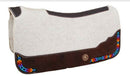 New for 2021!   Reinsman's APEX Performance Pressed Wool Felt Saddle Pad.  Made from 100% natural pressed wool felt for superior shock absorption and moisture wicking.  Cinch cut out.  Loin relief design won't bind the horse's movement.  Dark oil wear leathers have southwestern colorful beaded inlay. 