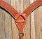 Close Up View Reinsman Heavy Duty 2" Double Ply Contoured Breast Collar with Hand Carved with Snowflake Tooling.    Stainless steel hardware and tugs.   1" x 12" adjustable elastic tugs.   Mahogany color.
