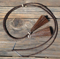 Close Up View natural horse hair stampede string with cotter pin attachments.    Dark Brown