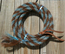 Hand made by Jose Ortiz, 5/8" x 22' mecate made from 6 tightly hand twisted (not machine twisted) strands of chestnut, white & turquoise  color mane hair with a soft leather popper at one end turks head knot on the other.  