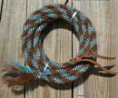 Hand made by Jose Ortiz, 5/8" x 22' mecate made from 6 tightly hand twisted (not machine twisted) strands of chestnut, white & turquoise  color mane hair with a soft leather popper at one end turks head knot on the other.  