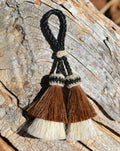 Close Up View 2" Double two Bell mule tail cut natural and brightly colored tassels. Handmade from horsehair dyed in bright colors as well as natural.   Brown/White