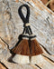 Close Up View 2" Double two Bell mule tail cut natural and brightly colored tassels. Handmade from horsehair dyed in bright colors as well as natural.   Brown/White