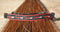 Close Up View Awesome 1/2" wide x 4" long, 3 Strand Braided Natural Horsehair Barrette.  Red/Black/White/Red