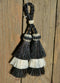 Close Up View 4" triple mule tail cut Double Tassels. Handmade horsehair dyed in bright colors as well as natural.     Black/White/Black