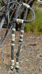 Jose Ortiz 5/8" Single One Ear Santa Maria Style Headstall.  Constructed of  12 plait black beveled rawhide with light natural rawhide details.  