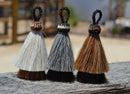 Close Up View Various Colors 3" two Bell mule tail cut natural and brightly colored tassels. Handmade from horsehair dyed in bright colors as well as natural.