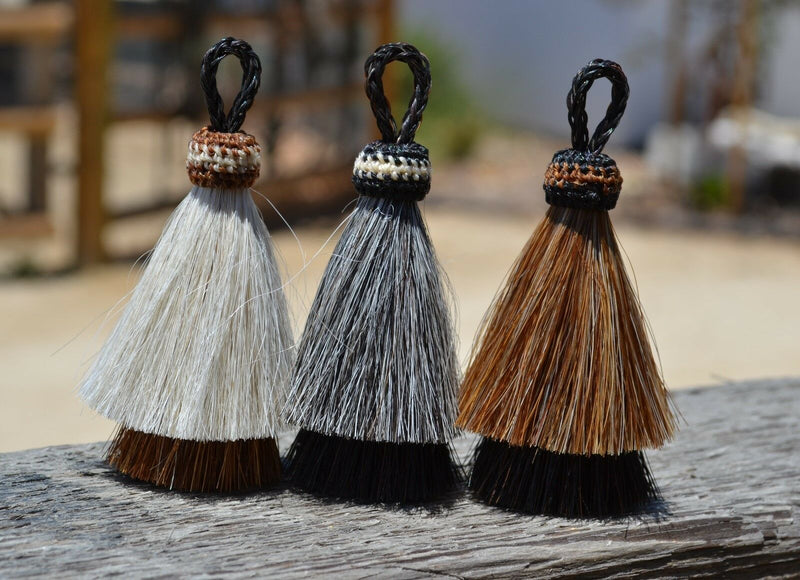 Close Up View Various Colors 3" two Bell mule tail cut natural and brightly colored tassels. Handmade from horsehair dyed in bright colors as well as natural.