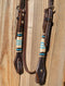 Jose Ortiz 5/8" Straight Browband Headstall.  Constructed of two-ply and stitched dark chocolate oil  finished leather.  Hand carved with Jose's signature basket weave tooling and natural hand braided rawhide with turquoise details on cheek pieces and browband.