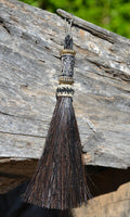 Close Up View 4 1/2" total length horsehair zipper pull with spring clip. Handmade horsehair various colors and beading pattern.    Black-Gold/Silver/Gold