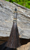 Close Up View 4 1/2" total length horsehair zipper pull with spring clip. Handmade horsehair various colors and beading pattern.    Black-Gold/Silver/Gold