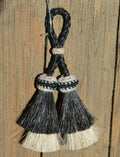 Close Up View 2" Double two Bell mule tail cut natural and brightly colored tassels. Handmade from horsehair dyed in bright colors as well as natural.   Black/White